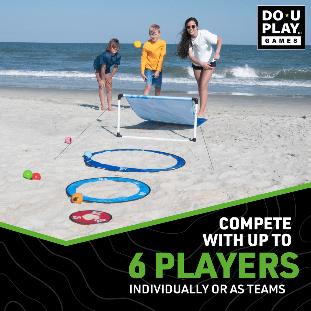 Family playing fast-paced Fish Fly yard game on beach