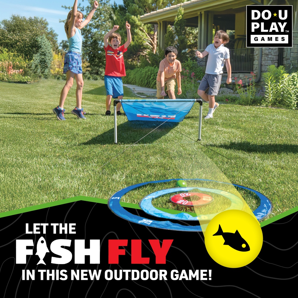 Kids playing Fish Fly yard game launching balls into scoring nets outdoors